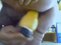 In my aged, hirsute chocolate hole, a huge yellow sex toy completely vanishes.